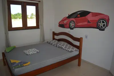 Uma cama ou camas num quarto em Casa do Sol