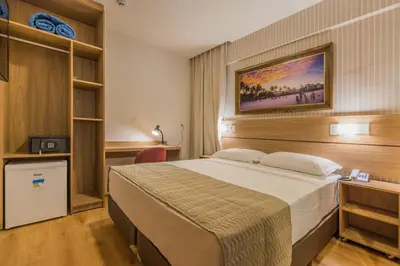 Uma cama ou camas num quarto em Bristol Guararapes Fortaleza Centro de Eventos