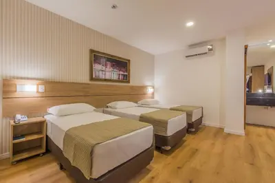 Uma cama ou camas num quarto em Bristol Guararapes Fortaleza Centro de Eventos