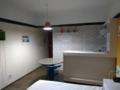 Uma cama ou camas num quarto em Flat Simples na Praia de Iracema