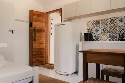 A cozinha ou kitchenette de Jeri Suites accommodation