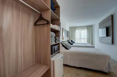 Uma cama ou camas num quarto em Hotel da Villa