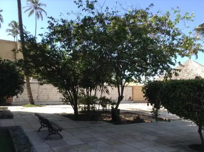 Um jardim no exterior de Eco Paradise ap 122