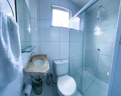 Uma casa de banho em Pousada das Maracanãs