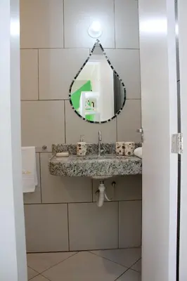 Uma casa de banho em Pousada da Luz