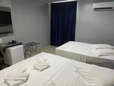Uma cama ou camas num quarto em Hotel Aquarius