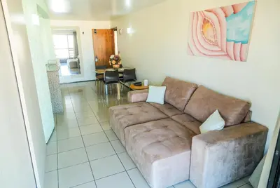 Uma área de estar em Belíssimo Apart com Vista Mar - Conforto a 100m da Orla