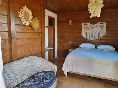Uma cama ou camas num quarto em Pousada Icaraizinho Praia