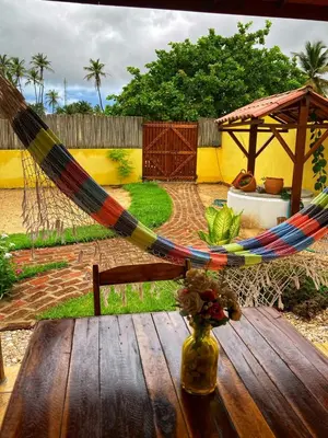 Um jardim no exterior de Pousada Icaraizinho Praia
