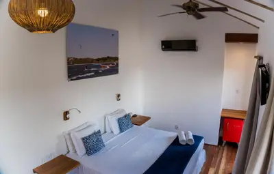 Uma cama ou camas num quarto em Jehol Jericoacoara