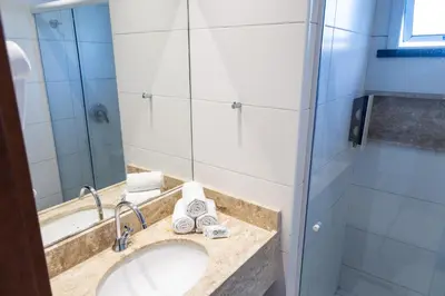Uma casa de banho em Aquidabã Praia Hotel