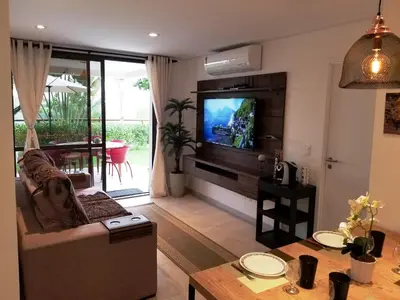 Uma televisão e/ou sistema de entretenimento em Wai Wai Cumbuco Eco Residence - Bahamas 101