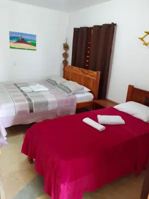 Uma cama ou camas num quarto em Jangadas do Pontal