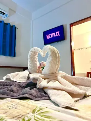 Uma cama ou camas num quarto em Residencial Bem-te-vi