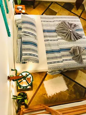 Uma cama ou camas num quarto em Residencial Bem-te-vi