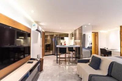 Uma televisão e/ou sistema de entretenimento em Particular Deluxe Iate Plaza