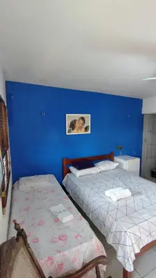 Uma cama ou camas num quarto em Suites Solar dos Arcanjos Guaramiranga