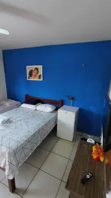 Uma cama ou camas num quarto em Suites Solar dos Arcanjos Guaramiranga