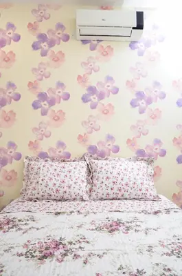 Uma cama ou camas num quarto em Pousada Casa da Adriana