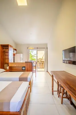 Uma cama ou camas num quarto em Villa das Palmeiras Jeri