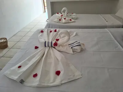 Uma cama ou camas num quarto em Pousada Brilho da Lua