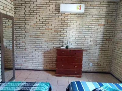 Uma cama ou camas num quarto em Linda casa próximo do Beach Park
