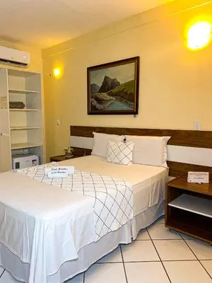 Uma cama ou camas num quarto em Hotel Monólitos