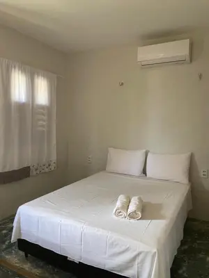 Uma cama ou camas num quarto em Beach Chalet Preá