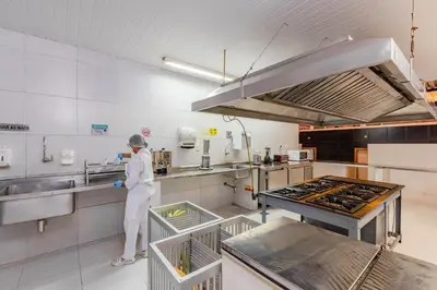 A cozinha ou kitchenette de Spa urbano Motel Adult Only