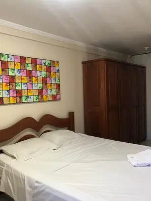 Uma cama ou camas num quarto em Porto de Iracema Residence CBT