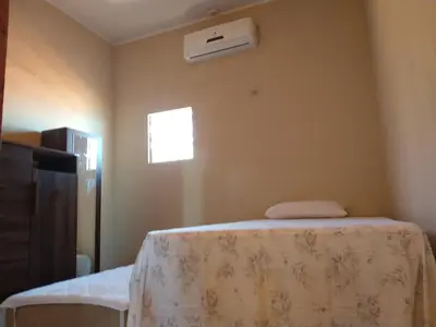 Uma cama ou camas num quarto em Chalé Sinfonia do Mar - Vista Paradisíaca