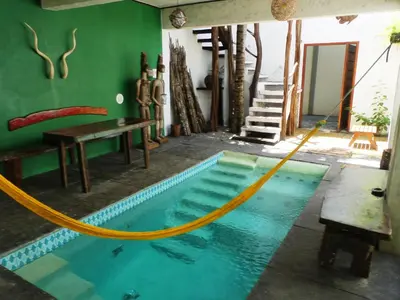 A piscina em ou perto de Pousada O Refúgio