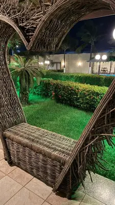 Um jardim no exterior de Hotel & Pousada Italia Beach - Porto Das Dunas