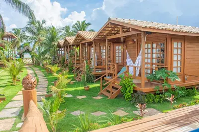 Um jardim no exterior de Pousada Villa del Lótus
