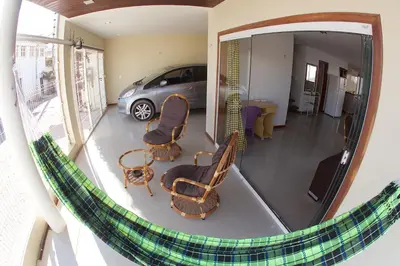 Uma área de estar em Casa Flecha