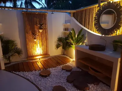 Uma área de estar em BAMBU BLU Lagoon Homes - Ilha do Guajiru