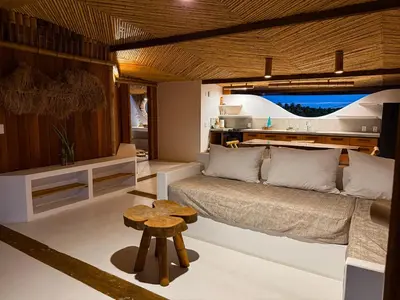 Uma área de estar em BAMBU BLU Lagoon Homes - Ilha do Guajiru