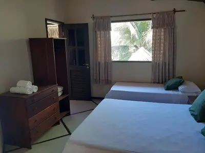 Uma cama ou camas num quarto em Casa na linda praia de Jericoacoara