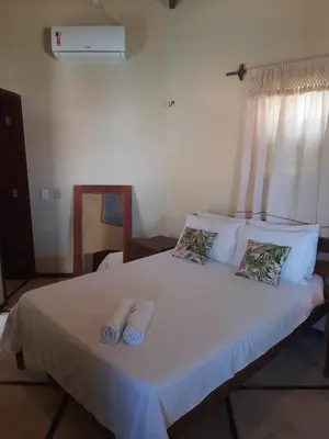 Uma cama ou camas num quarto em Casa na linda praia de Jericoacoara