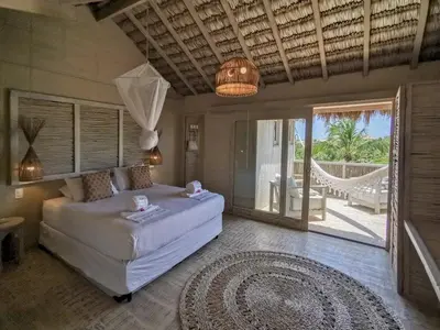 Uma cama ou camas num quarto em Apê Bossa Nova, aconchego e charme!
