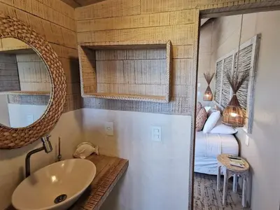Uma casa de banho em Apê Bossa Nova, aconchego e charme!