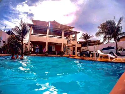 A piscina em ou perto de Mansão Triplex 10 Suítes a 150 metros do Mar e Beach Park
