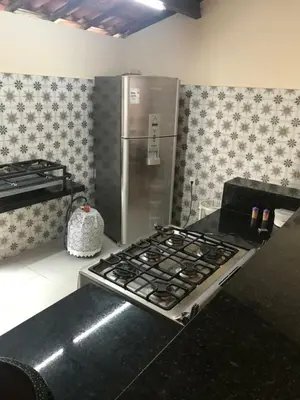 A cozinha ou kitchenette de Mansão Rústica 10 Suítes a 150 metros do Mar e Beach Park