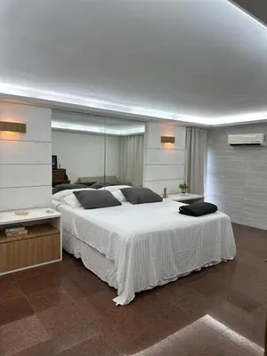 Uma cama ou camas num quarto em Solar Beach Front