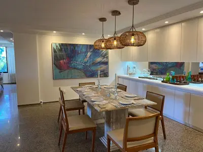 Uma televisão e/ou sistema de entretenimento em Solar Beach Front