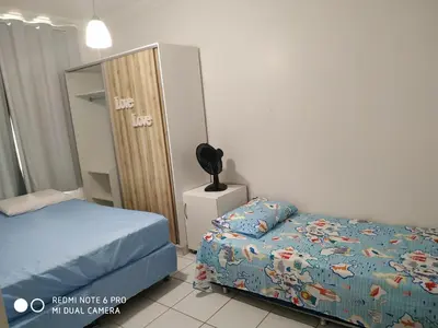 Uma cama ou camas num quarto em Porto das Dunas