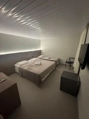 Uma cama ou camas num quarto em Hotel Pousada Villa Marina