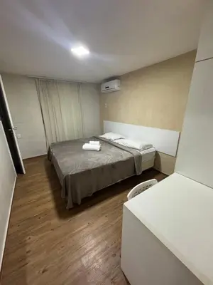 Uma cama ou camas num quarto em Hotel Pousada Villa Marina