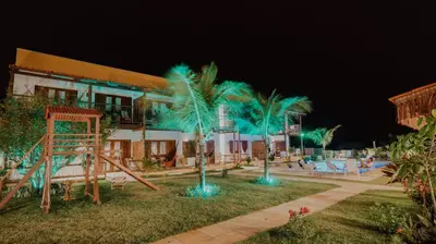 Um jardim no exterior de Villa Aurora
