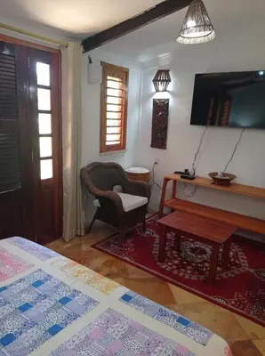 Uma área de estar em Pousada Yuste Beach Farm